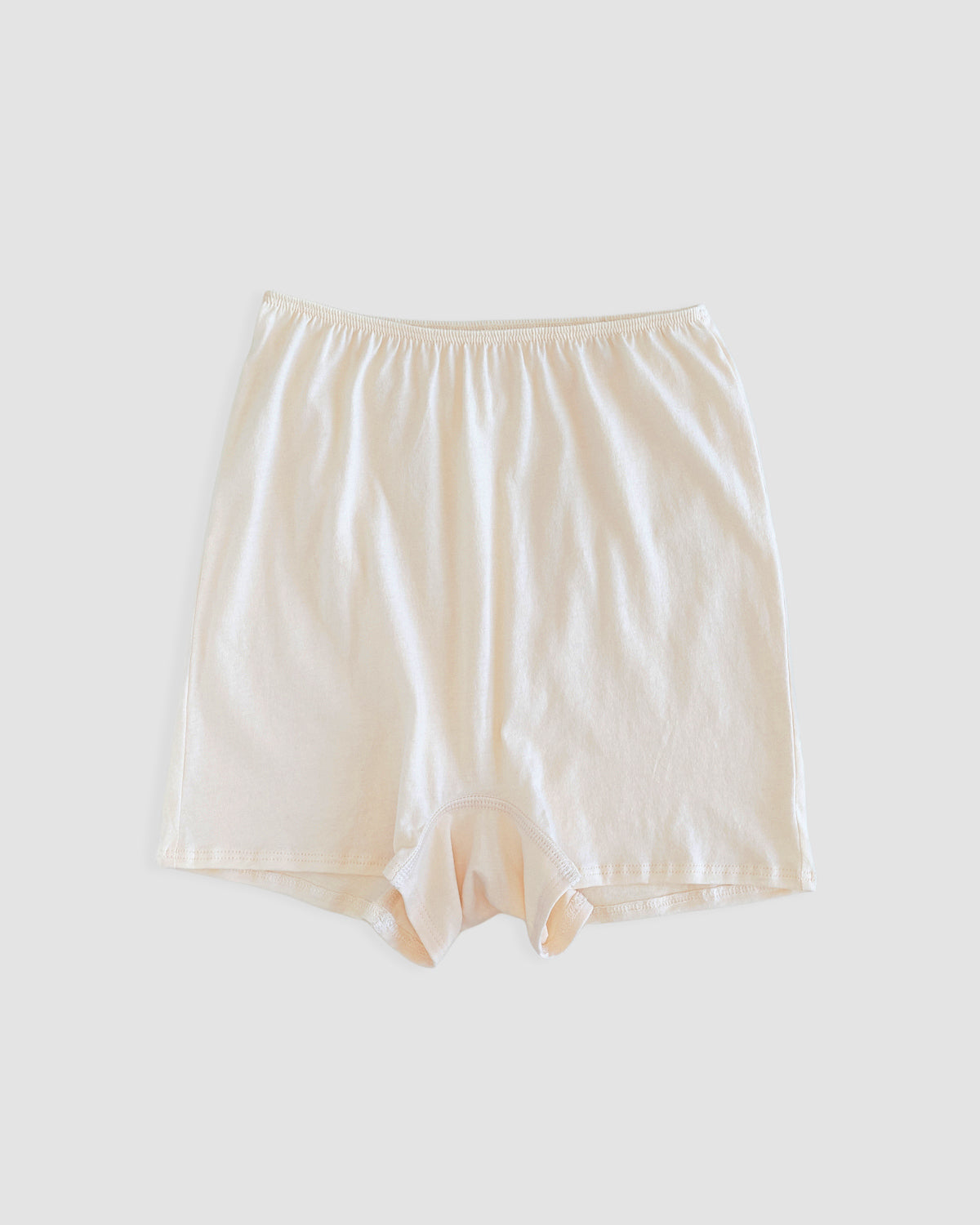 front of high sleep short in greige